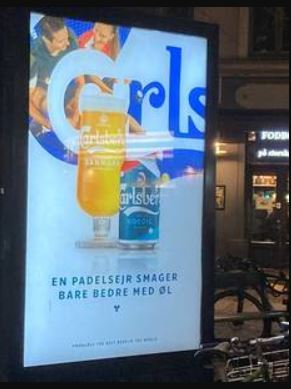 Carlsberg. En padelsejr smager bare bedre med øl.